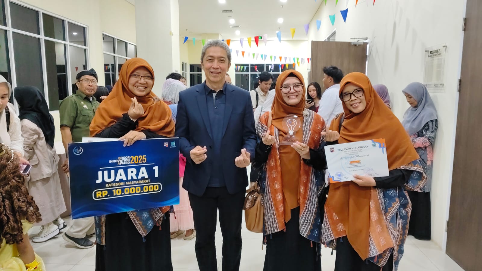 Proyek Bengkel Emak Ojol Sabet Juara 1 BIA 2025